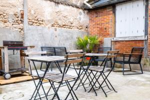Patio nebo venkovní prostory v ubytování Studio cosy RDC, calme avec cour extérieure