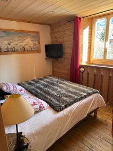 Postel nebo postele na pokoji v ubytování Hôtel Restaurant de la Chaussée