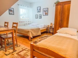 Posteľ alebo postele v izbe v ubytovaní Willa Konda - bania , sauna