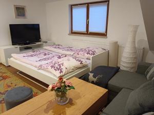 Postel nebo postele na pokoji v ubytování Haus Josef, Apartment mit Balkon und 2 Schlafzimmer