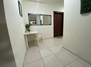 TV a/nebo společenská místnost v ubytování Newly Furnished Room in Barsha 1 Near MOE