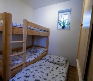 Posteľ alebo postele v izbe v ubytovaní Apartmán ACTIVE