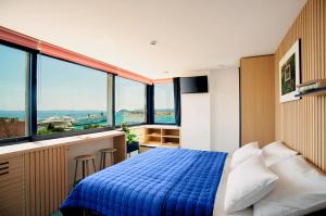 Posteľ alebo postele v izbe v ubytovaní Horizon Luxury Suites & Design Rooms