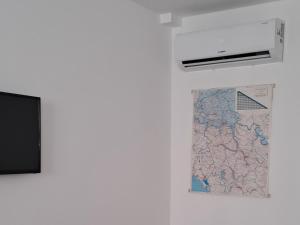 TV a/nebo společenská místnost v ubytování Studio apartman "Kutak DIVUS"