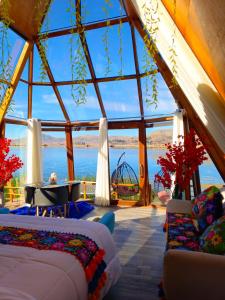 Postel nebo postele na pokoji v ubytování Titicaca Glampina