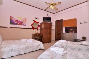 Postel nebo postele na pokoji v ubytování Μαριάνθη + 4 fotografie