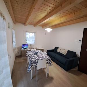TV a/nebo společenská místnost v ubytování Sogno delle Dolomiti + 37 fotografií