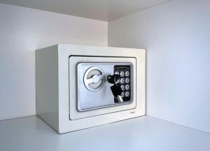 an electronic box with a remote control in it at Palace City Apartman,T13, AC, Klima in Székesfehérvár