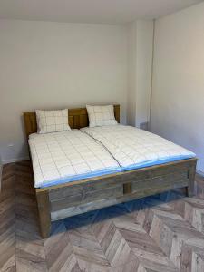 Postel nebo postele na pokoji v ubytování Dom Bystrá