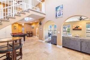 a home with a living room with a pool table at Flagstaff Family Retreat in Flagstaff