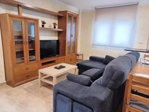 TV a/nebo společenská místnost v ubytování Vivienda dos Domingos en A Costa da Morte