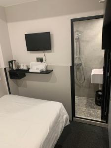 A bathroom at MK STAY - formerly HOTEL MK