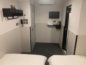 MK STAY - formerly HOTEL MK TV 또는 엔터테인먼트 센터