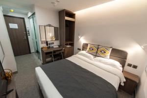 MK STAY - formerly HOTEL MK 객실 침대