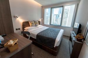 MK STAY - formerly HOTEL MK 객실 침대