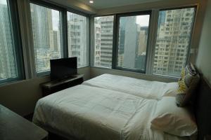 MK STAY - formerly HOTEL MK 객실 침대