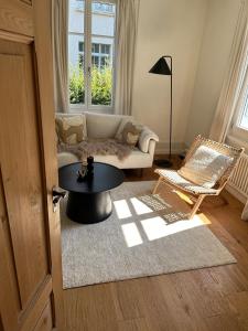 Ein Sitzbereich in der Unterkunft fuchsart like home