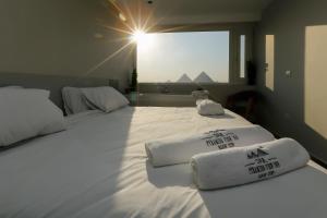 Katil atau katil-katil dalam bilik di DAR Pyramids View Inn - Rooftop
