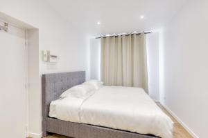 Ένα ή περισσότερα κρεβάτια σε δωμάτιο στο Luxueux et chic - Bobigny - Paris