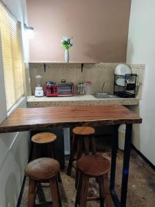 Kuchyň nebo kuchyňský kout v ubytování BACALAR INN Hotel