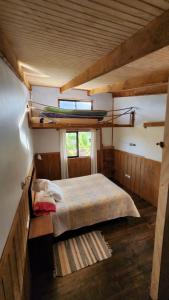 En eller flere senge i et værelse på Casa cerro