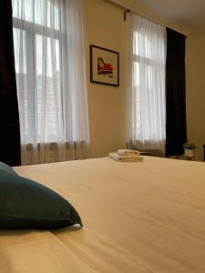 Rúm í herbergi á Coliving - sharing space EU