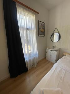 Rúm í herbergi á Coliving - sharing space EU