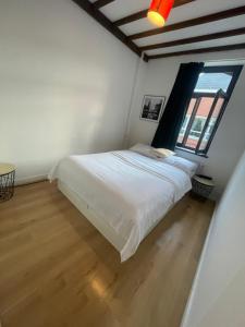 Rúm í herbergi á Coliving - sharing space EU