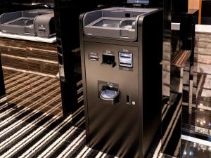 an atm machine in a store at APA Hotel Roppongi SIX in Tokyo