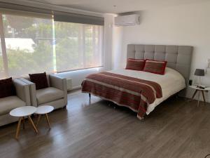 Postel nebo postele na pokoji v ubytování Casa Vitacura 12p pool snow shopping clinicas 5 dorm - 8 camas