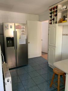 Kuchyň nebo kuchyňský kout v ubytování Casa Vitacura 12p pool snow shopping clinicas 5 dorm - 8 camas