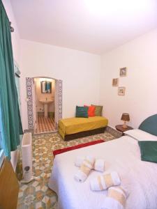 Katil atau katil-katil dalam bilik di Riad Nostalgie of Tetouan