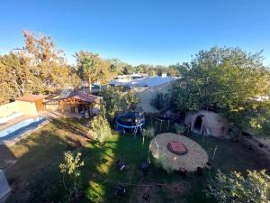 an aerial view of a backyard with a large outdoor grill at depa del Oso in Nuevo Casas Grandes