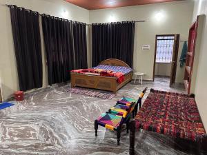 Postel nebo postele na pokoji v ubytování Village Homestay + 12 fotografií