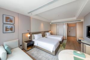 Fotografie z fotogalerie ubytování Nanjing Yangzi River Conference Center Longshan Lake Hotel v destinaci Nan-ťing