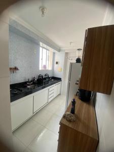 Kuchyň nebo kuchyňský kout v ubytování Apartamento completo próximo ao aeroporto CNF cidade do galo e cidade adm + 8 fotografií