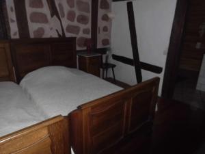 Postel nebo postele na pokoji v ubytování Chambre d'Hôtes chez Nadine Hamm