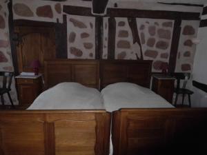 Postel nebo postele na pokoji v ubytování Chambre d'Hôtes chez Nadine Hamm