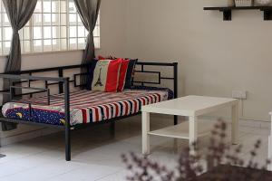 Ένα ή περισσότερα κρεβάτια σε δωμάτιο στο 马六甲老地方3房住宿