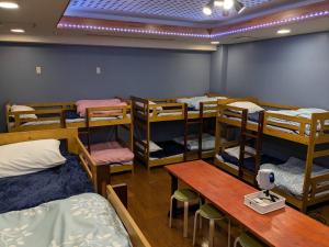 Postel nebo postele na pokoji v ubytování 大山ベースキャンプ Daisen Basecamp