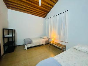 Katil atau katil-katil dalam bilik di Casa em Penedo - Condomínio +19 gambar