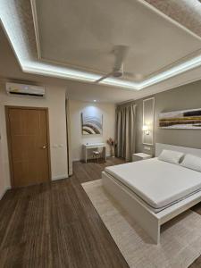 Soficu Hotel El Edén Dominicus客房内的一张或多张床位