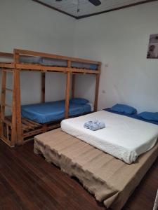 Postel nebo postele na pokoji v ubytování Hotel Cortez Azul