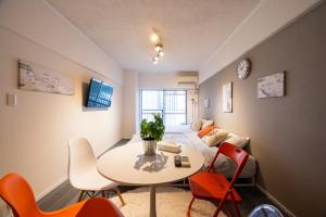 Χώρος καθιστικού στο urban stay 博多-博多駅徒歩6分-Wi-fi完備2タイプ