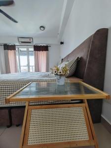 Postel nebo postele na pokoji v ubytování Suite U Family Suite D'Perdana + 5 fotografií