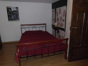 Postel nebo postele na pokoji v ubytování Chambre d'Hôtes chez Nadine Hamm