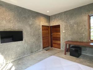 TV a/nebo společenská místnost v ubytování COCO HOME Homestay(โคโค่โฮม)