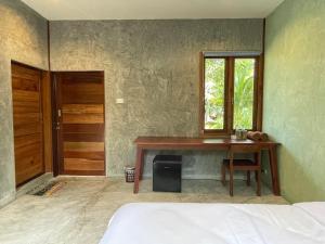 Postel nebo postele na pokoji v ubytování COCO HOME Homestay(โคโค่โฮม)