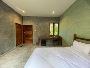 Postel nebo postele na pokoji v ubytování COCO HOME Homestay(โคโค่โฮม)