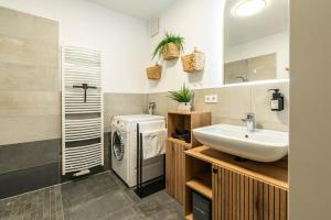 Koupelna v ubytování Design Apartments Erfurt City - Terrasse - Streaming - Privatparkplatz - Klinikum - Uni - zentral + 40 fotografií